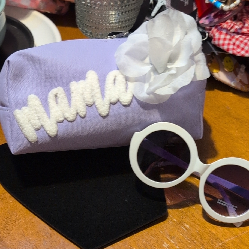Purple Clutch with White Flower and Sunglasses